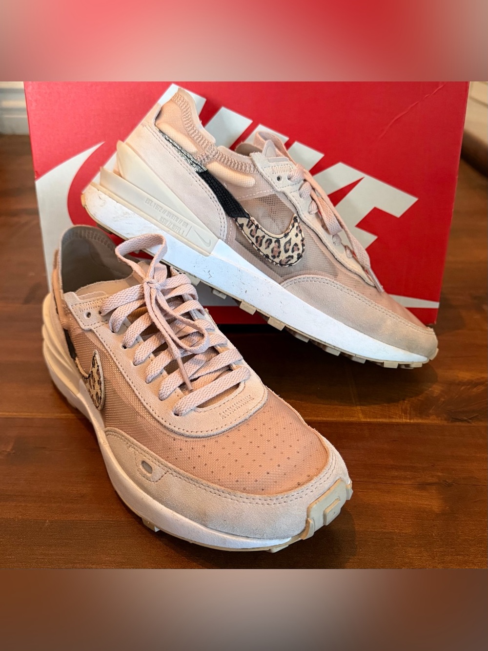 Nike Women's Blush Pink Sneakers with Leopard Swoosh Accent